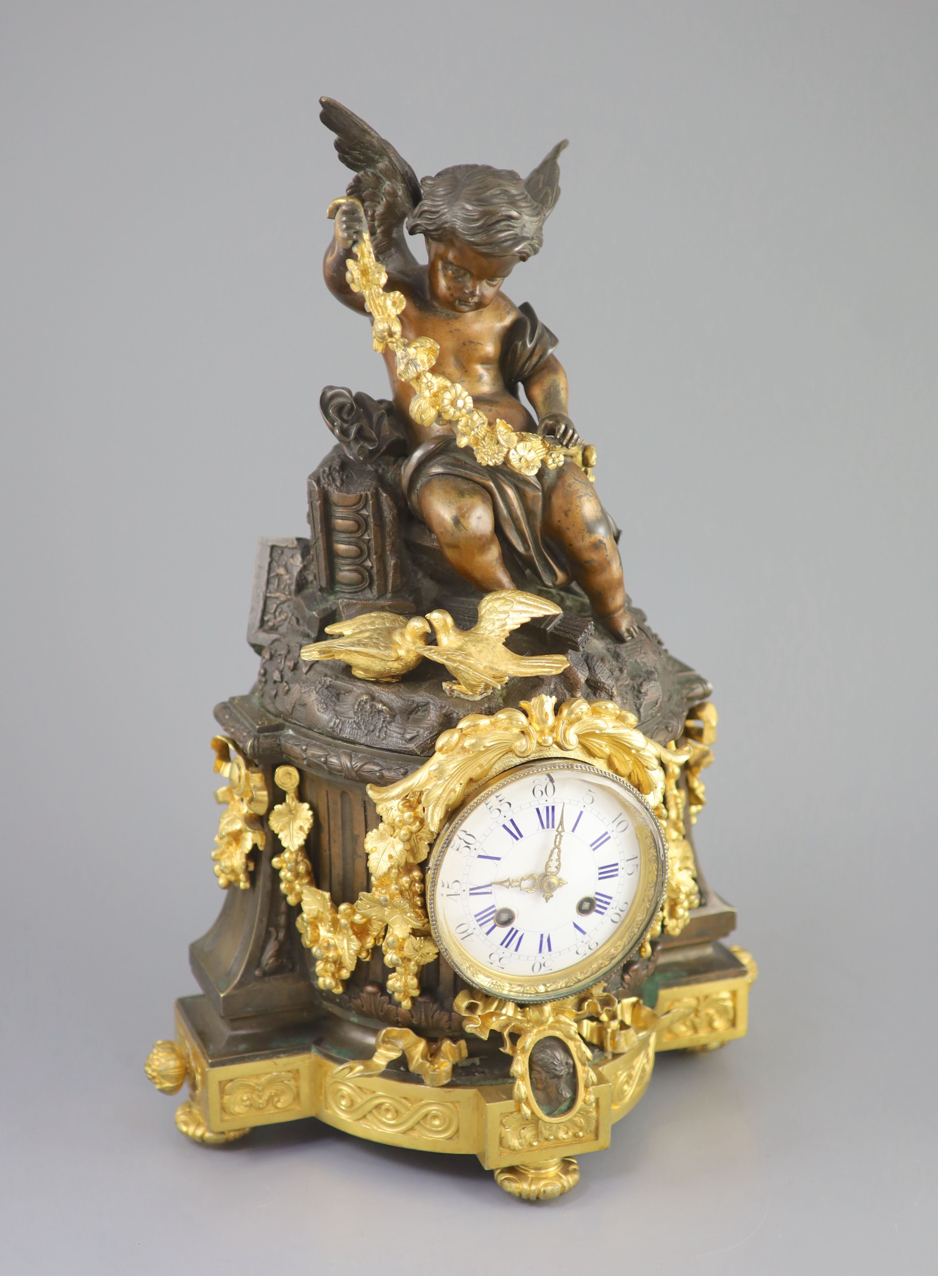 A large French figural bronze and ormolu mantel clock, 19th century 46cm high.